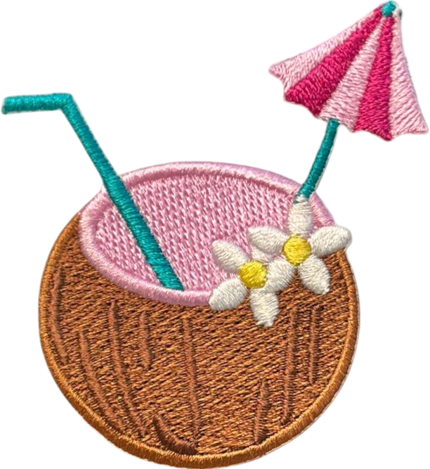 Embroidered patch of a coconut drink with a straw and umbrella on a white background