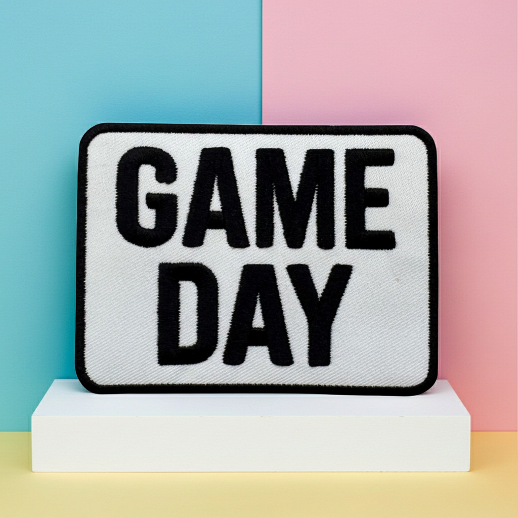 Decorative pillow with 'GAME DAY' text on a colorful background
