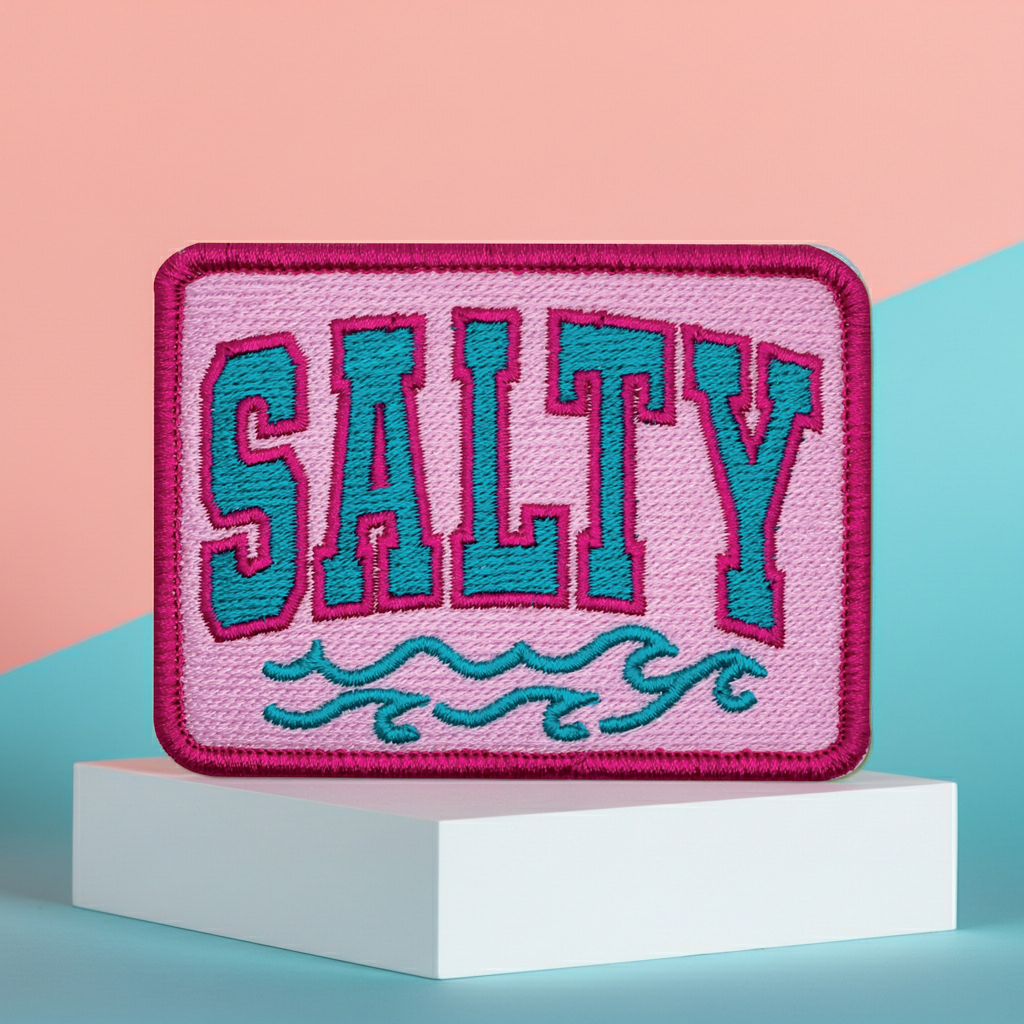 Pink patch with 'SALTY' text on a colorful background